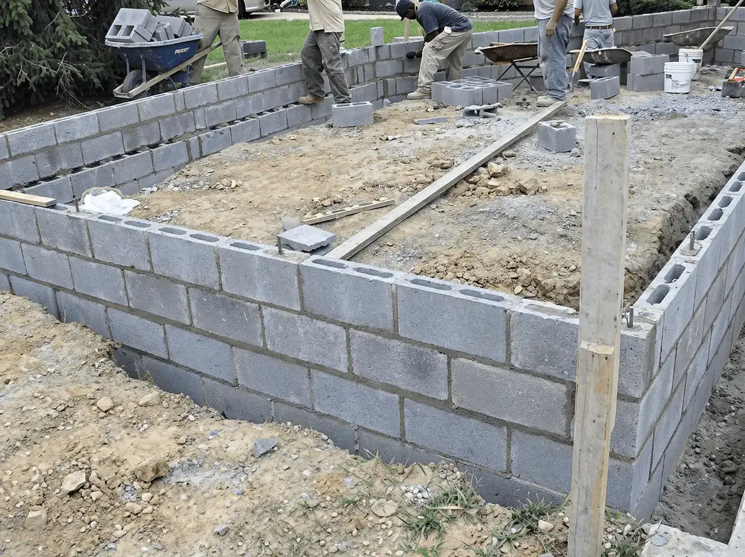 Professionals building a foundation with blocks in Tampa, FL