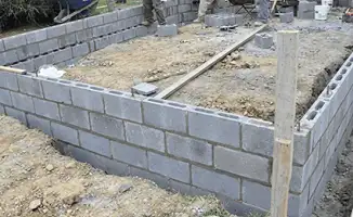 Professionals building a foundation with blocks in Tampa, FL