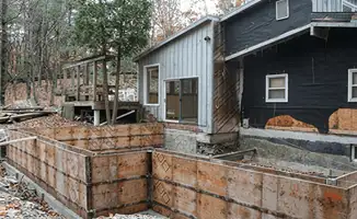 Prepared site with foundation forms for home remodeling and addition project in Tampa, FL